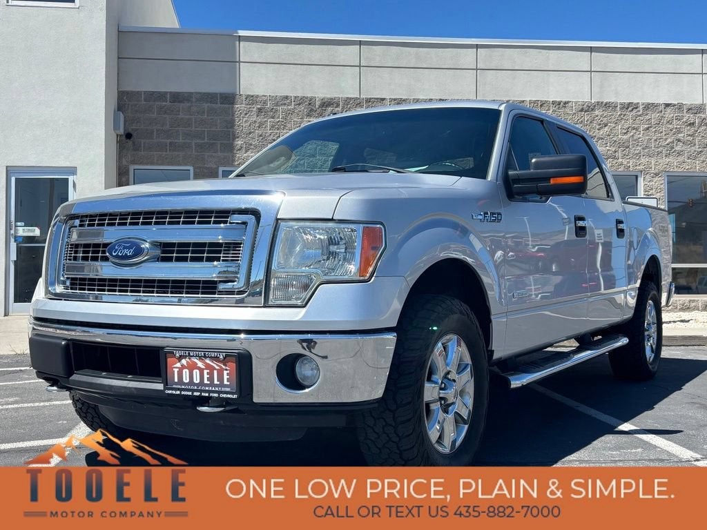 2014 Ford F-150 XLT in Silver — front three-quarter view